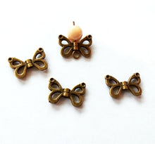 Load image into Gallery viewer, 10 Butterfly Wing Beads Antiqued Bronze Wing Beads Wing Charms Bead Frames Butterfly Charms 10pcs 15mm