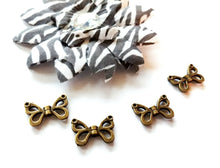 Load image into Gallery viewer, 10 Butterfly Wing Beads Antiqued Bronze Wing Beads Wing Charms Bead Frames Butterfly Charms 10pcs 15mm