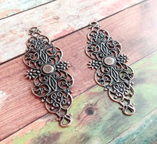 Load image into Gallery viewer, 2 Filigree Stampings Antiqued Bronze Cabochon Setting Blanks Long Connector Pendants 62mm