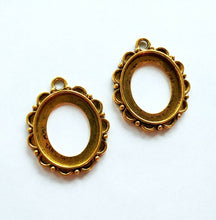 Load image into Gallery viewer, 4 Cabochon Frame Pendants Antiqued Gold Pendants Cameo Settings Cabochon Settings Oval Cabochon Frames 33mm