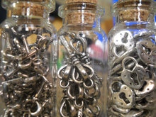 Load image into Gallery viewer, Skeleton Keys, Lock Charms, Glass Vials, Steampunk Lot Glass Vials With Corks Assorted Charms Antiqued Silver 103pcs