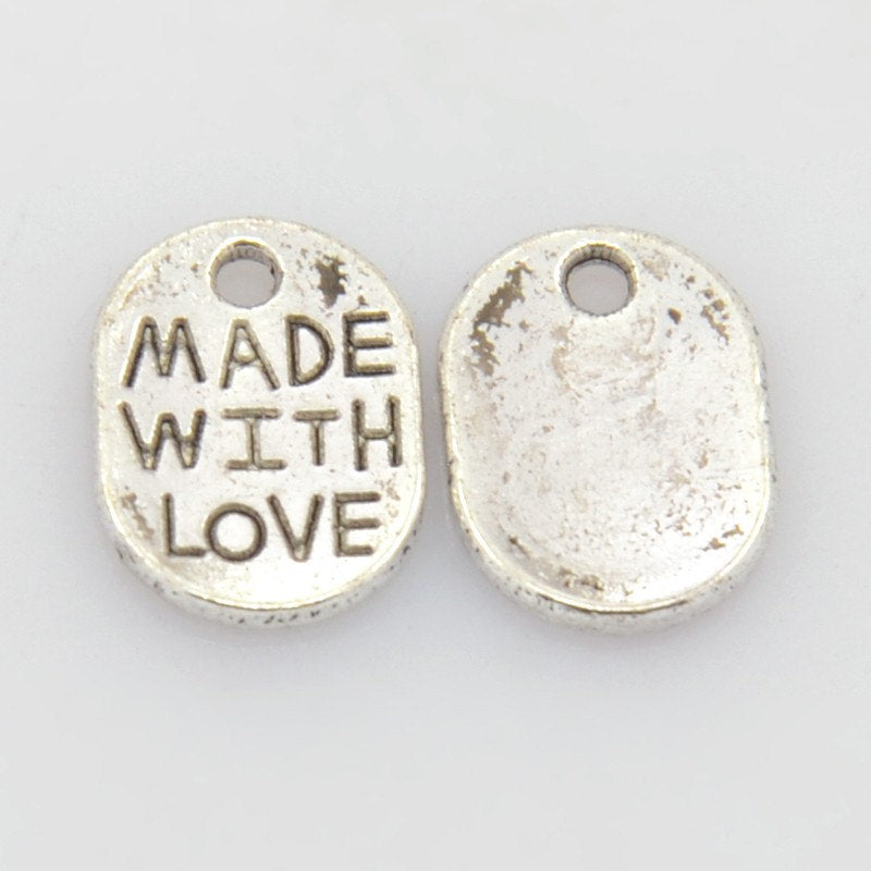 Made With Love Charms Antiqued Silver Charms Oval Jewelry Tags Silver Made with Love Tag Charms 25 pieces WHOLESALE Bulk 11mm